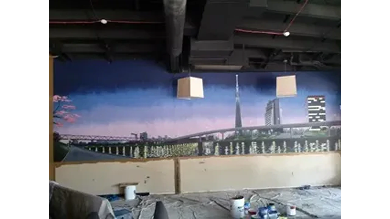 A large mural of the bridge in the middle of a room.